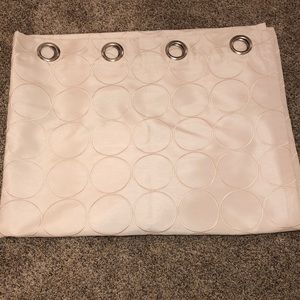 Ivory full length hoop curtains.